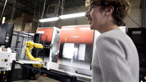 Student with robotic arm